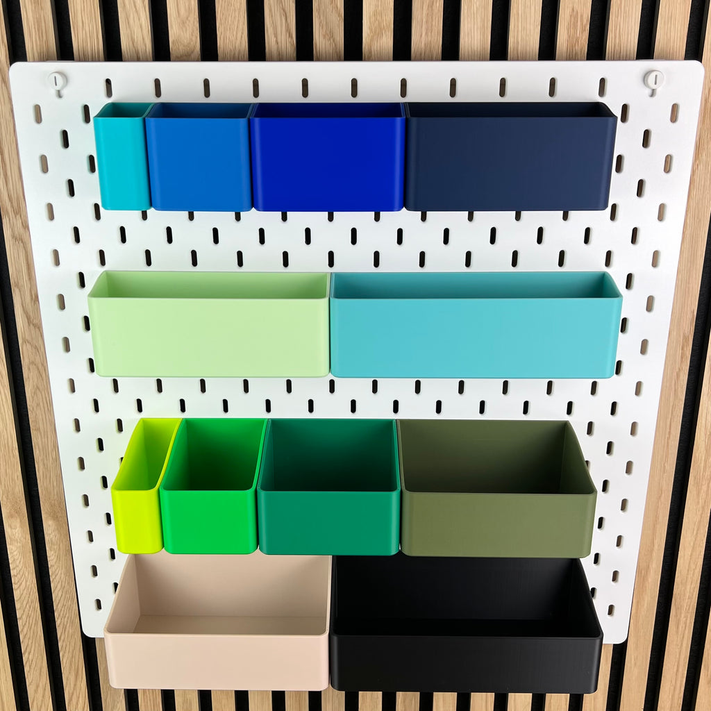 Kalttöne im Überblick: SKÅDIS Boxen in Blau, Mint, Grün, Oliv, Beige und Schwarz